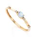 Anel de Ouro Dezoito Kilates Topázio Swiss Oval com Diamantes Joiasgold