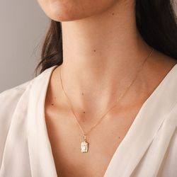 pingente-ouro-dezoito-kilates-face-cristo-media-modelo-joiasgold