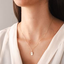 pingente-ouro-dezoito-kilates-face-cristo-pequena-modelo-joiasgold