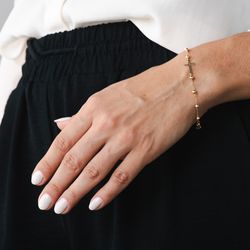 pulseira-ouro-dezoito-kilates-cruz-bolinhas-19cm-joiasgold