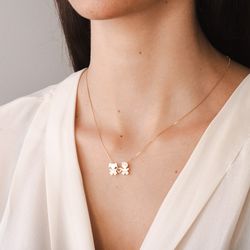 pingente-ouro-bicolor-dezoito-kilates-menino-menina-coracao-vazado-modelo-joiasgold